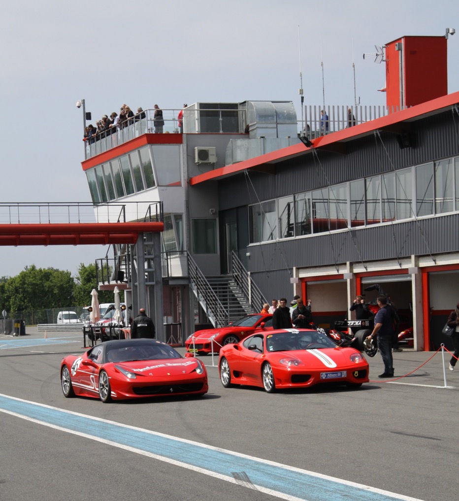 Ferrari 430 and 599 safety cars at a previous edition of Sport et Collection.